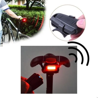 COB Fuente de luz brillante Control remoto inalámbrico Alarma antirrobo para bicicletas con 110 dB de sonido