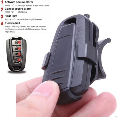 COB Fuente de luz brillante Control remoto inalámbrico Alarma antirrobo para bicicletas con 110 dB de sonido